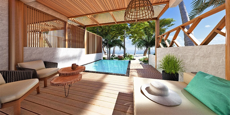 The outdoor area and pool of a beach villa at Island Luxury Retreat Maalhos, Maldives. 
