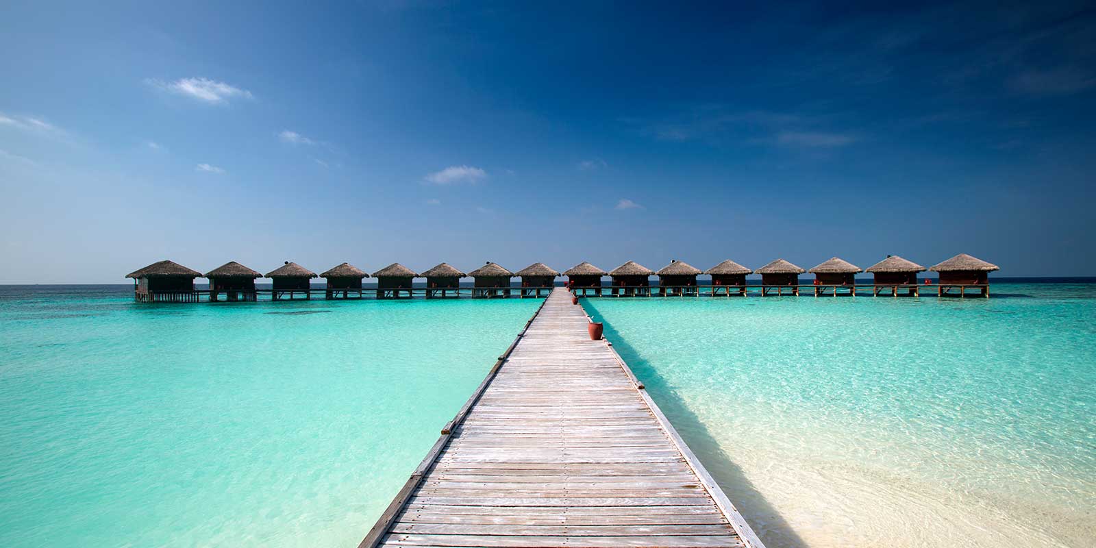 Jetty to the water villas at Filitheyo Resort, The Maldives