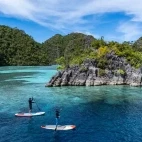 Paddleboarding from Amira liveaboard in Indonesia