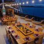 Outdoor restaurant on board Amira liveaboard in Indonesia