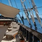 Outdoor restaurant on board Amira liveaboard in Indonesia