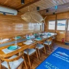 The saloon seating area on Komodo Aggressor, Indonesia.