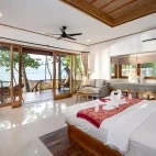 Oceanfront villa bedroom at Murex Manado in Indonesia