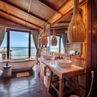 Premium bungalow bathroom at Papua Paradise Eco Resort in Raja Ampat, Indonesia