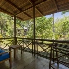 Garden view villa terrace at Siladen Resort & Spa in Indonesia