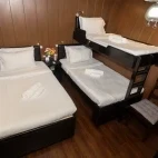 Deluxe triple cabin on board Atlantis Infiniti Liveaboard in the Philippines.
