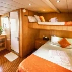 Owner suite cabin on board Atlantis Adventurer liveaboard in the Philippines