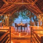 Treetop dining at Atmosphere Resort & Spa. Holiday accommodation in Dauin, Philippines.