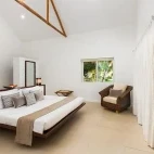Penthouse master bedroom at Atmosphere Resort & Spa. Holiday accommodation in Dauin, Philippines.