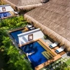 Aerial of the premium suite swimming pool at Atmosphere Resort & Spa. Holiday accommodation in Dauin, Philippines
