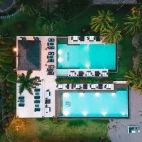 Swimming pool aerial at Atmosphere Resort & Spa. Holiday accommodation in Dauin, Philippines