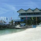 Beach view looking towards Blue Corals Beach Resort in Malapascua, the Philippines
