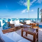 The outdoor bar and lounge area at Blue Corals Beach Resort in Malapascua, the Philippines