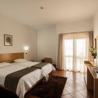 A bedroom at the Hotel Santa Maria.