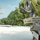 Signposts on the island around Coco Palm Dhuni Kolhu Resort, Maldives