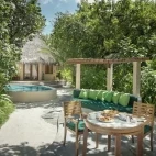 External view of the Deluxe Pool Villa at Coco Palm Dhuni Kolhu Resort, Maldives