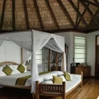 A Lagoon Villa bedroom, at Coco Palm Dhuni Kolhu Resort, Maldives