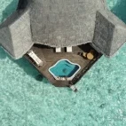 Aerial view of a Sunset Lagoon Villa at Coco Palm Dhuni Kolhu Resort, Maldives