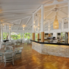 View of the bar during the day, at Embudu Village Maldives.