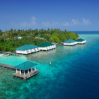 Aerial view of the overwater villas at Embudu Village, Maldives.