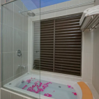 View of a bathroom at an overwater villa, Embudu Village, Maldives.