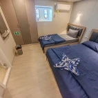 Lower deck twin cabin on board Emperor Serenity in the Maldives