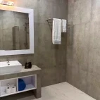 The deluxe room bathroom at Island Luxury Dive Hotel, Maldives.