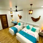 A super deluxe room at Island Luxury Dive Hotel, Maldives.