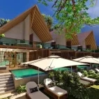 View of a beach villa with pool at Island Luxury Retreat Maalhos, Maldives.
