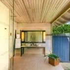 Beach villa bathroom at Kuredu Resort & Spa in the Maldives.