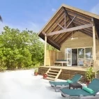 Deluxe beach villa at Kuredu Resort & Spa in the Maldives