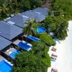 Aerial view of the beach suites with private pools, at Lily Beach Resort & Spa, Maldives.