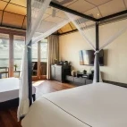 Internal view of a deluxe water villa at Lily Beach Resort & Spa, Maldives.