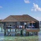 View of a deluxe water villa at Lily Beach Resort & Spa, Maldives.