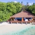 External view of a lagoon villa at Lily Beach Resort & Spa, Maldives.