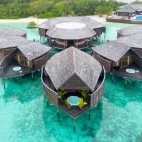 Aerial view of some of the bungalows at Lily Beach Resort & Spa, Maldives.