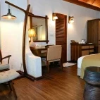 View inside one of the bungalows, with ample storage space and vanity at Makunudu Island Resort.