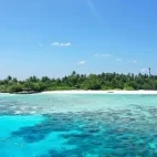 View of the Makunudu Island Resort from the water, Maldives.