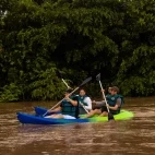 Kayakers on the Napo River, Ecuador.