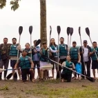 Group posing for a photo after a kayaking excursion on the Napo River, Ecuador.