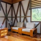 View of the seating area in the mini suite room at Napo Cultural Centre Lodge, Ecuador.