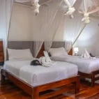 A standard two-bed room at  Napo Cultural Centre Lodge, Ecuador.