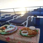Sunset nibbles on board Emperor Bilikiki liveaboard in the Solomon Islands