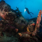 Diver alongside the Catalina Wreck, Solomon Islands.