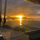 The netted relaxing area at sunset, on Aqua Tiki III, French Polynesia.