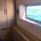 Window view from a double cabin on Aqua Tiki III, French Polynesia.