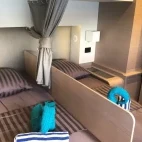 Example of the flexible twin-double accommodation on Aqua Tiki III, in Tahiti, South Pacific.