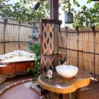 Beachfront Rai Ki Waya bure bathroom at Barefoot Kuata Island Resort in Fiji