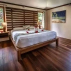 Garden bure bedroom at Beqa Lagoon Resort in Fiji.