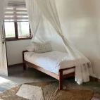 Room with an extra bed, at Blu @ Tofu, Mozambique.